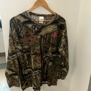 Women’s fit small, medium camp shirt